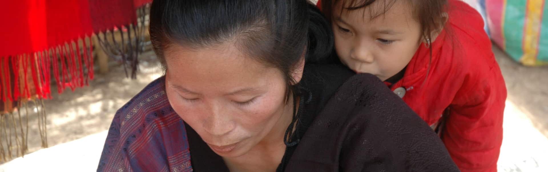 Textile worker in Laos in 2011 (Photo M.Chen)